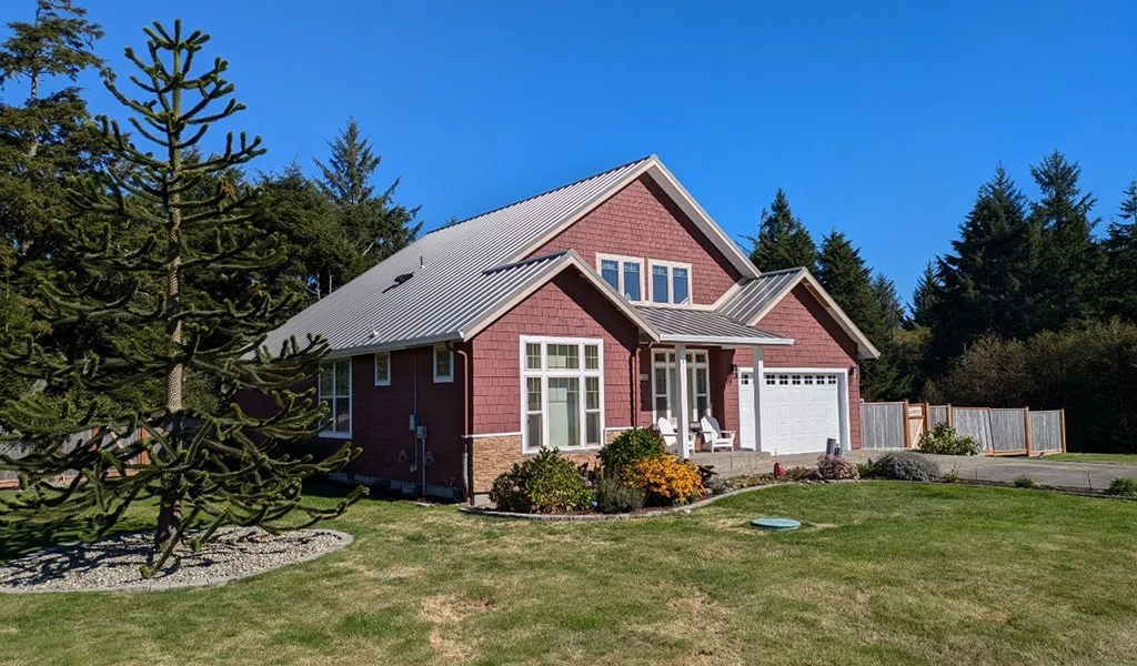 The Ilwaco Residence in Ilwaco, WA featuring ASC Building Products' Skyline Roofing® in Old Zinc Gray